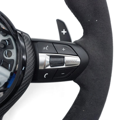 alcantara,leder lenkrad in schwarz mit carbon spange